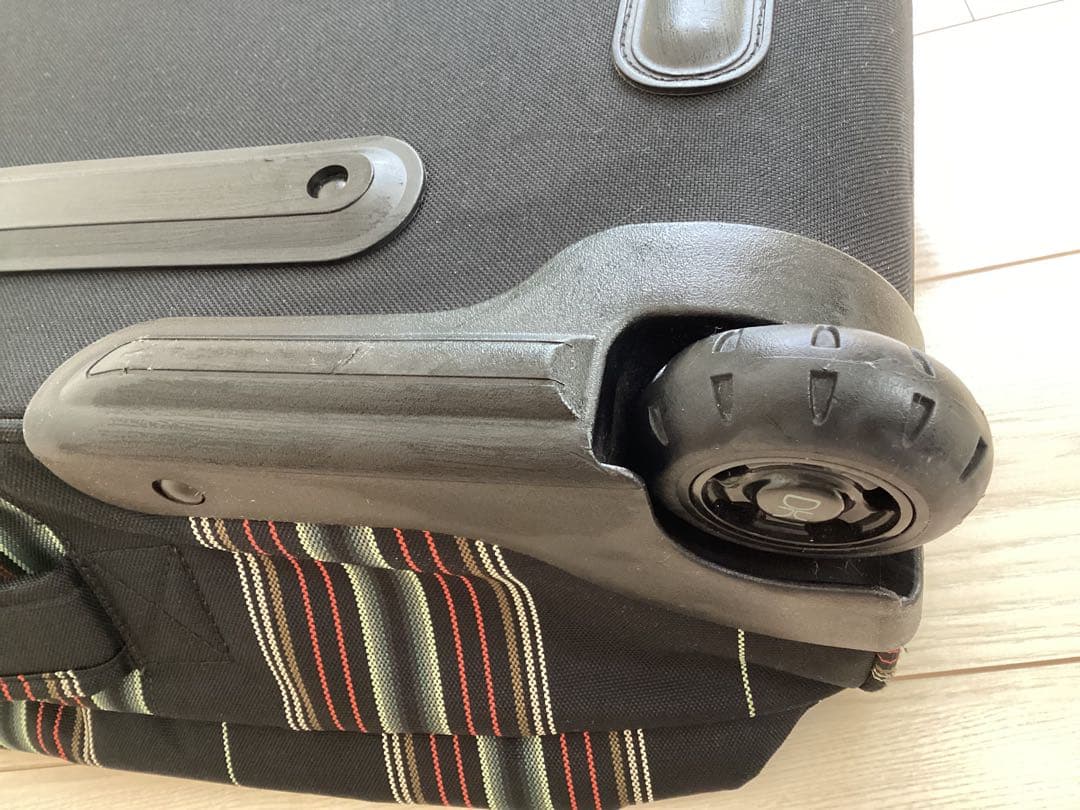 美品　DAKINE チェック柄 キャリーケース40L T字ハンドル