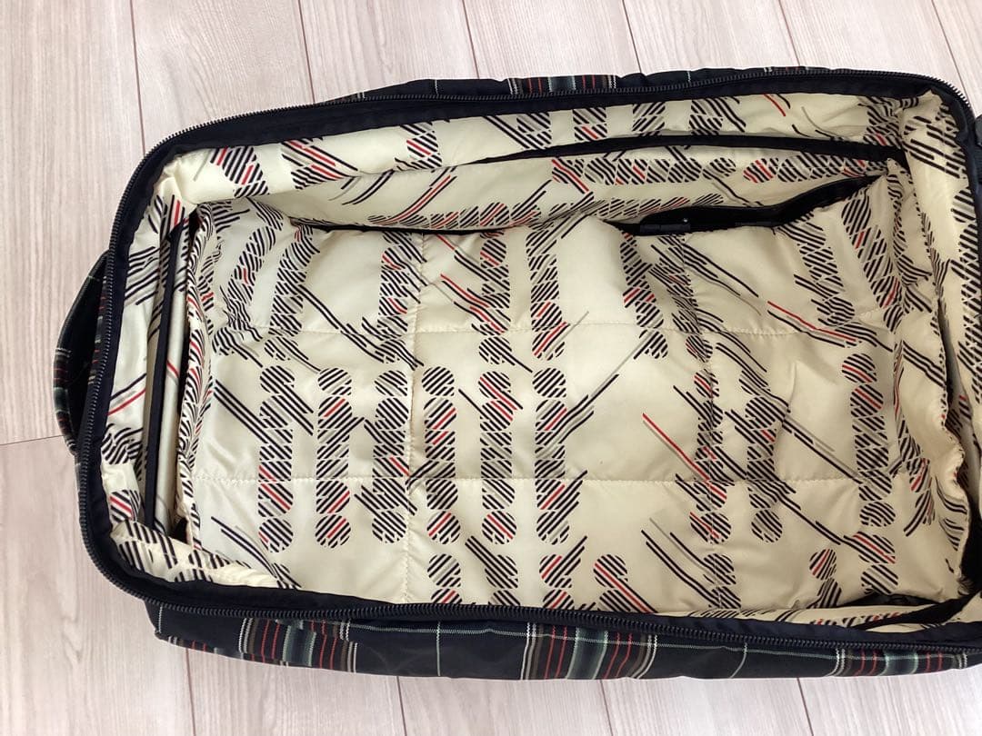 美品　DAKINE チェック柄 キャリーケース40L T字ハンドル