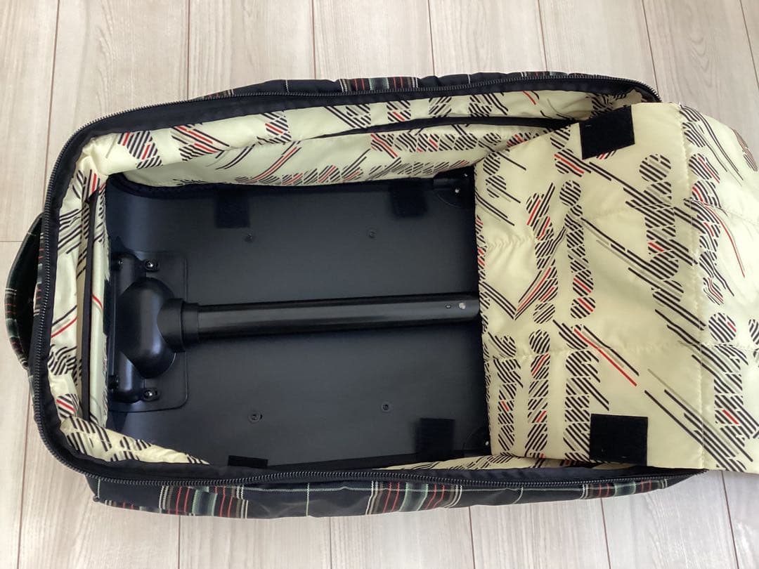 美品　DAKINE チェック柄 キャリーケース40L T字ハンドル