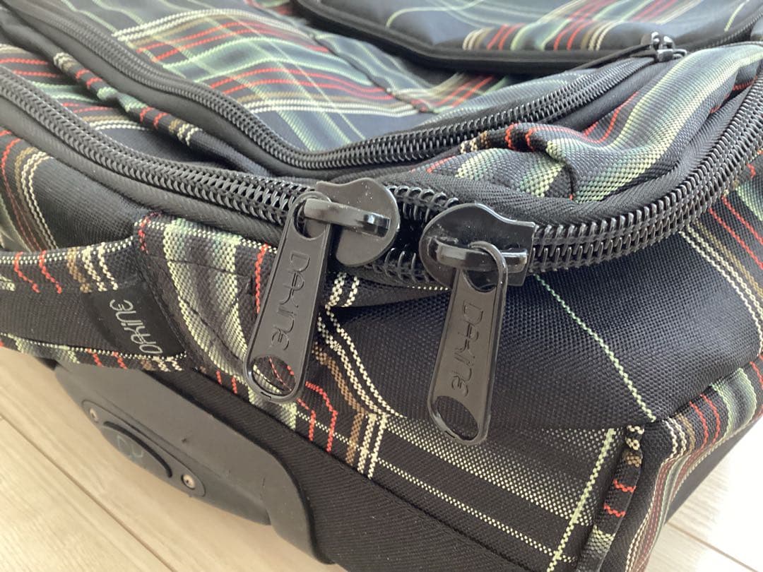 美品　DAKINE チェック柄 キャリーケース40L T字ハンドル