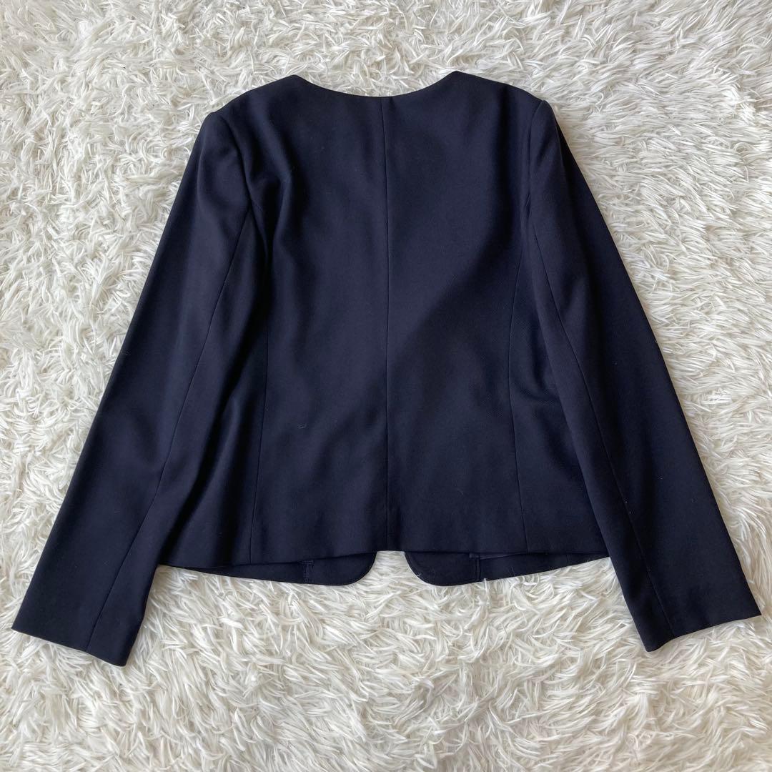 ナチュラルビューティベーシック ノーカラージャケットパンツセットアップ 濃紺 S