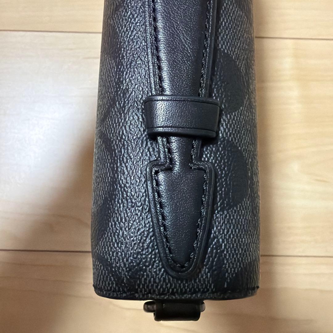 コーチ ダブルジップ トラベル オーガナイザー・シグネチャー キャンバス 長財布