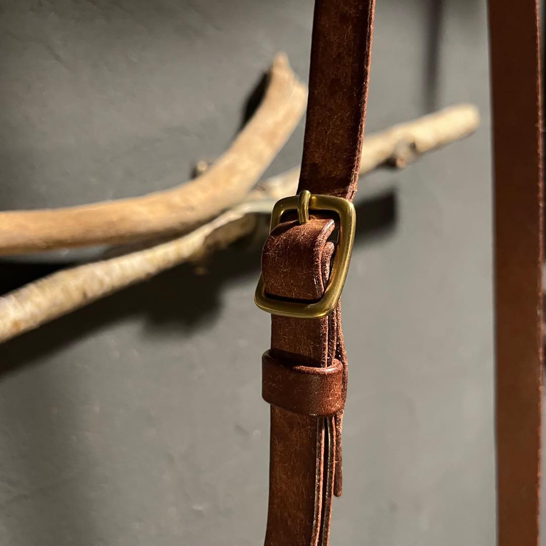 プエプロレザーのポシェット レザーミニバッグ 冬コーデアイテム