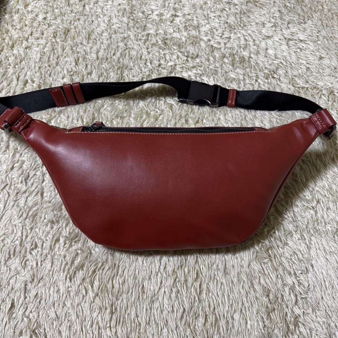 コーチ　ウエストポーチ　スヌーピー　コラボ　シグネチャー　斜め掛け　ボディバッグ