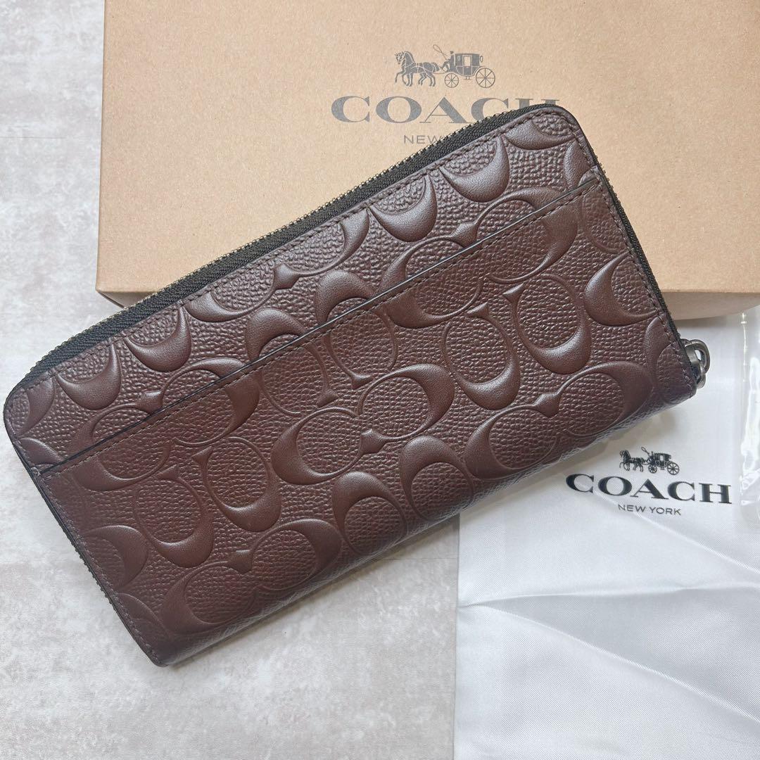 新品未使用 コーチ シグネチャー型押しエンボス レザー ブラウン 長財布