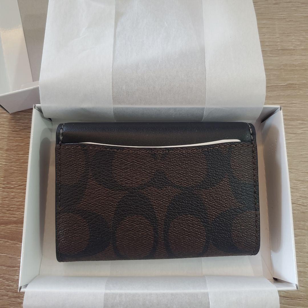 コーチ フラップ カード ケース 名刺入れ 黒 ブラウン シグネチャー 新品