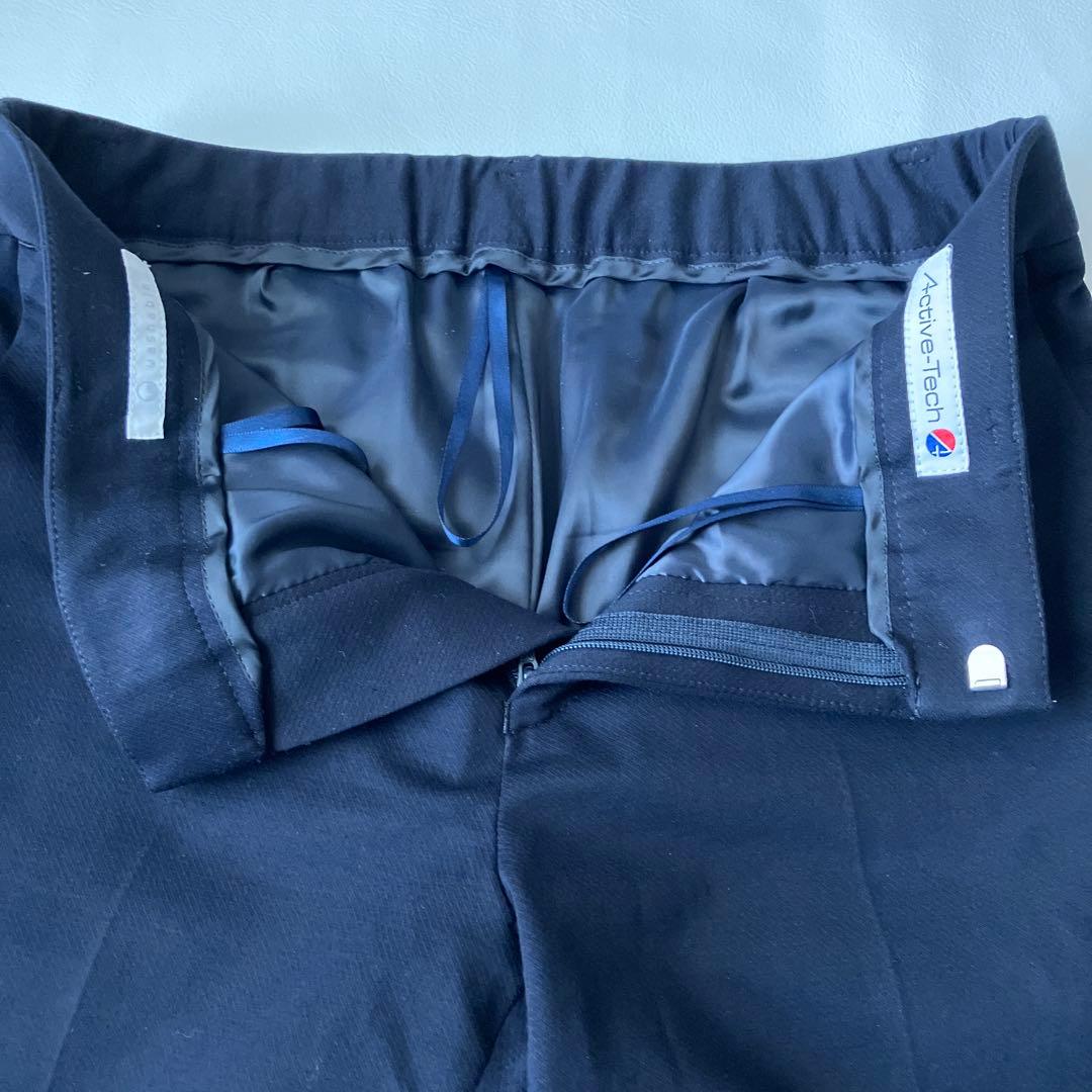 新品【アオキ　LES MUES】ネイビー ノーカラー パンツスーツ　レディース