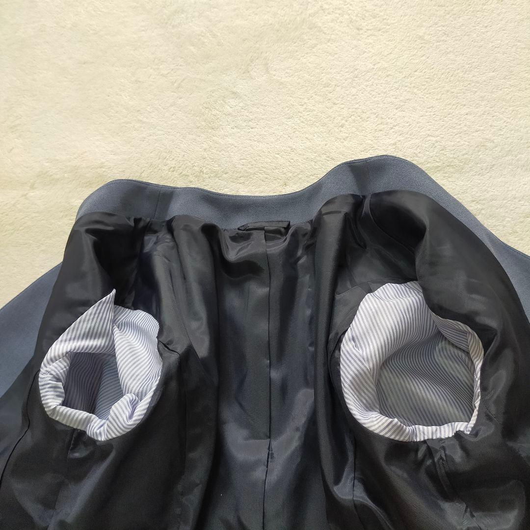 美品　40　ユニバーサルランゲージ　ノーカラー　パンツスーツ　ウォッシャブル