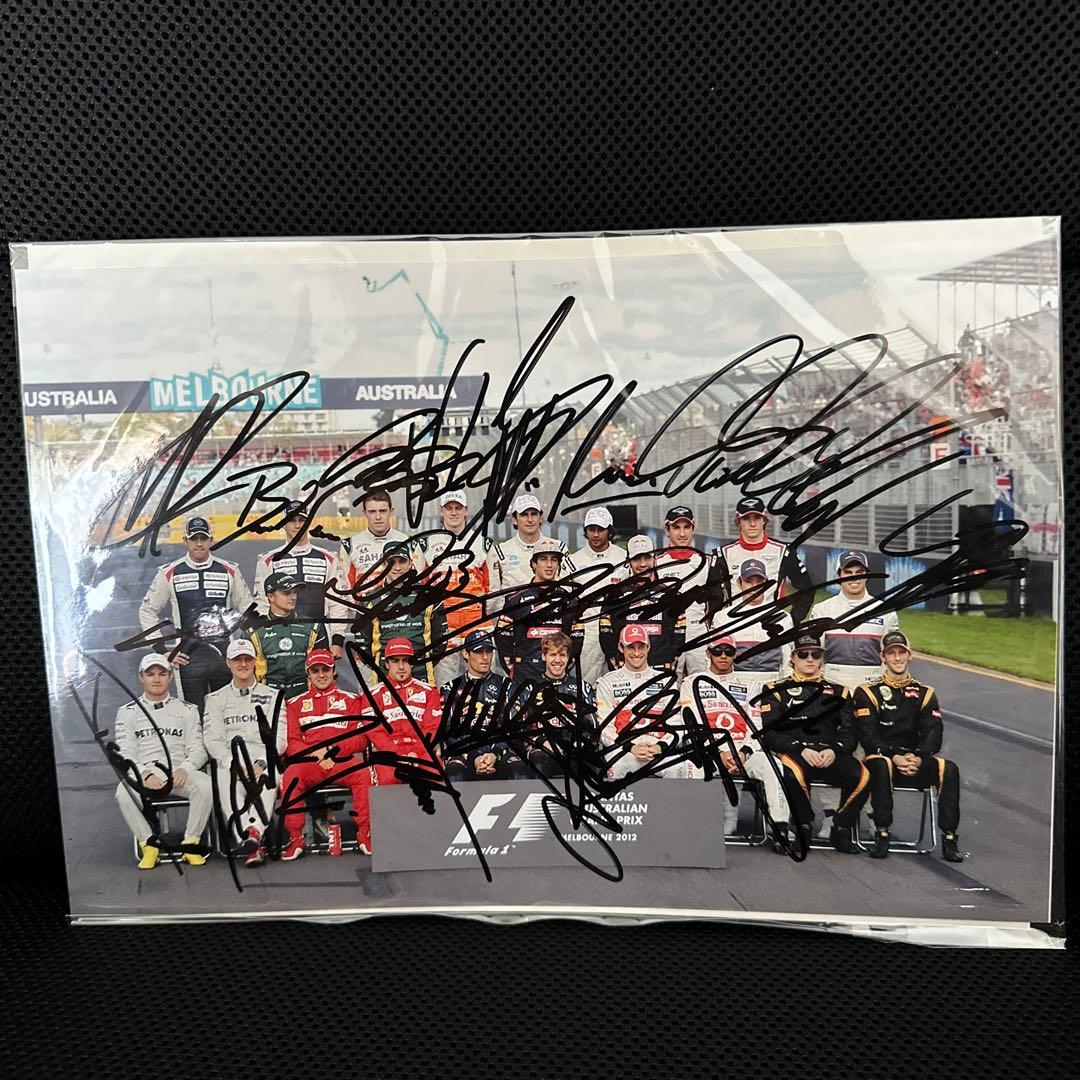 F1 ドライバー 直筆サイン入り写真 2012