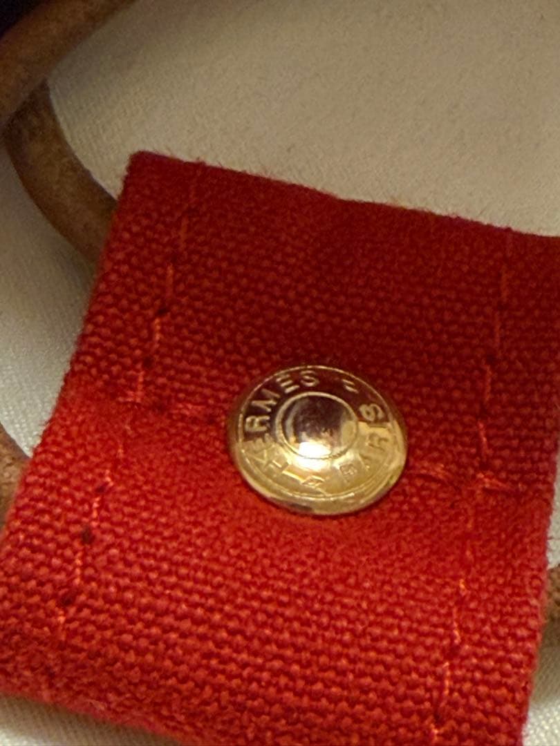 エルメス 赤 キャンバス ドローストリングショルダーバック