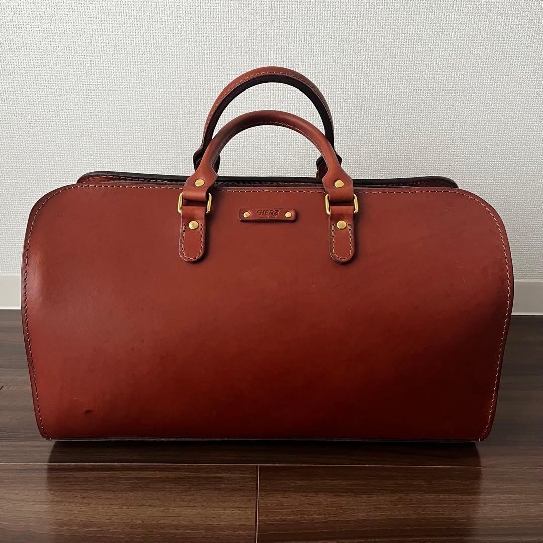 ヘルツ 二本手ファスナーボストンバッグ