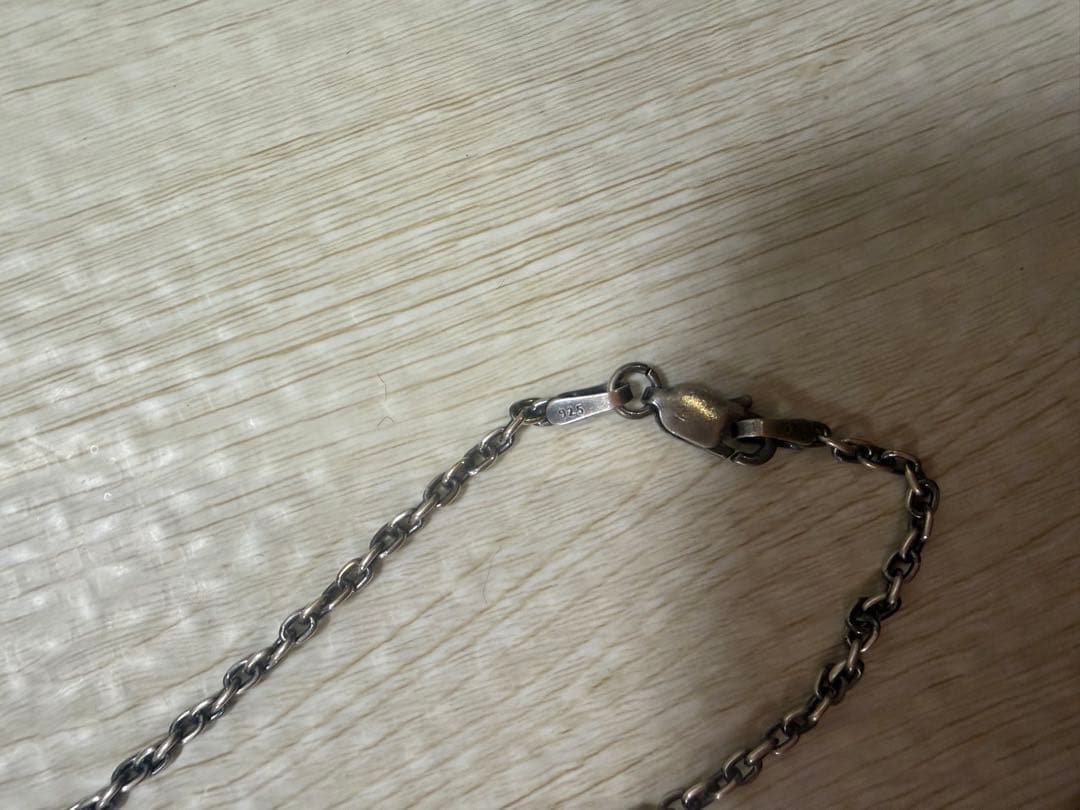 羽根モチーフ ネックレス 青い石付き