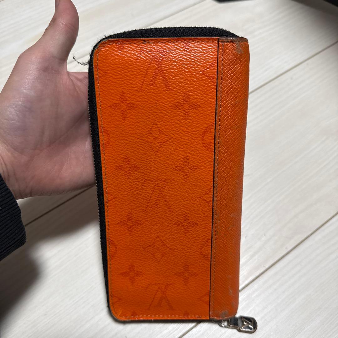 ルイ・ヴィトン モノグラム・タイガラマ ジッピーウォレット オレンジ色