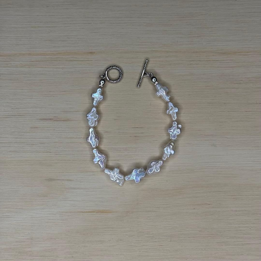 アクセサリー COOTIE Distortion Cross Pearl Bracelet
