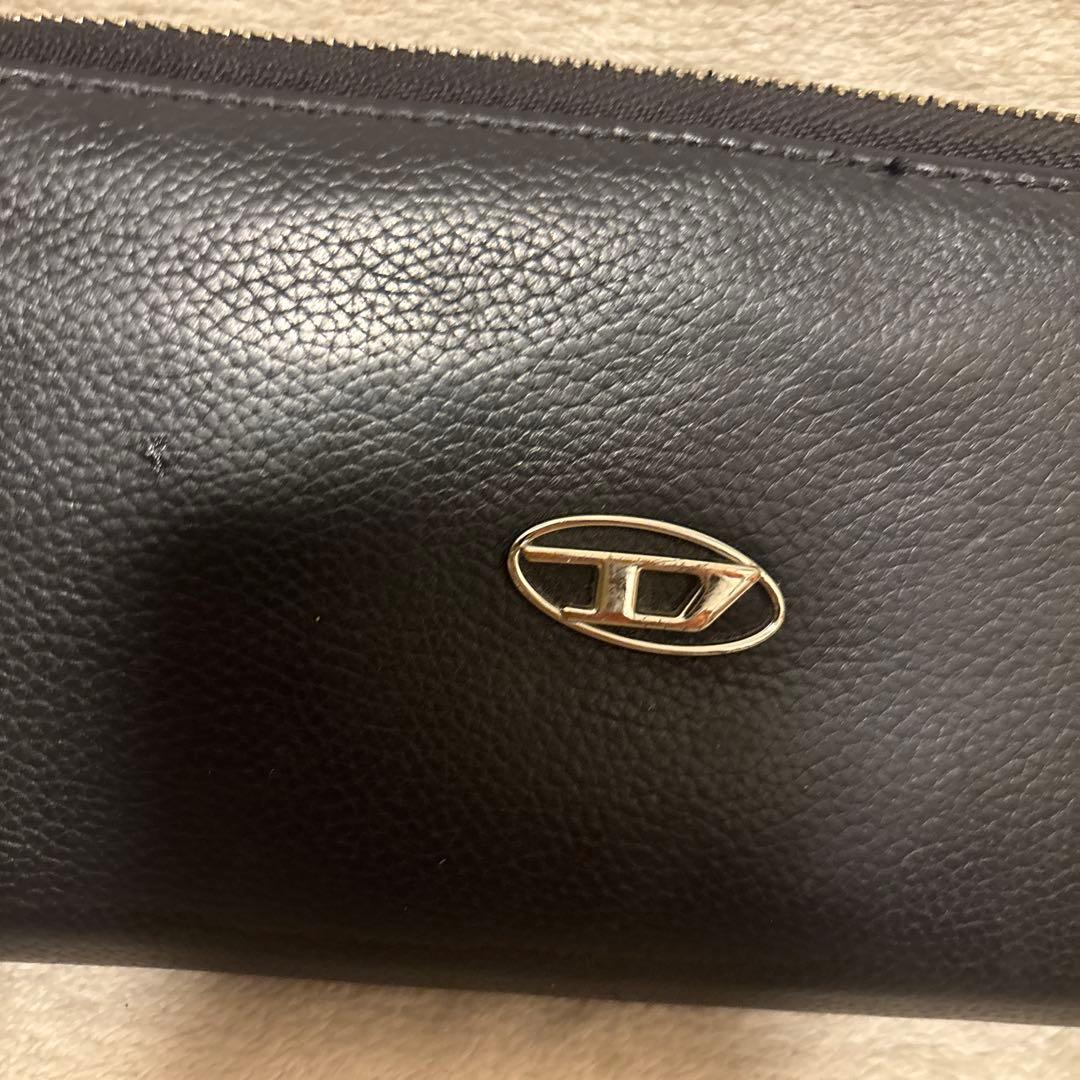 現行✨ディーゼル 長財布 Dロゴ 牛革 シボ革 エンボス 黒　ラウンドジップ