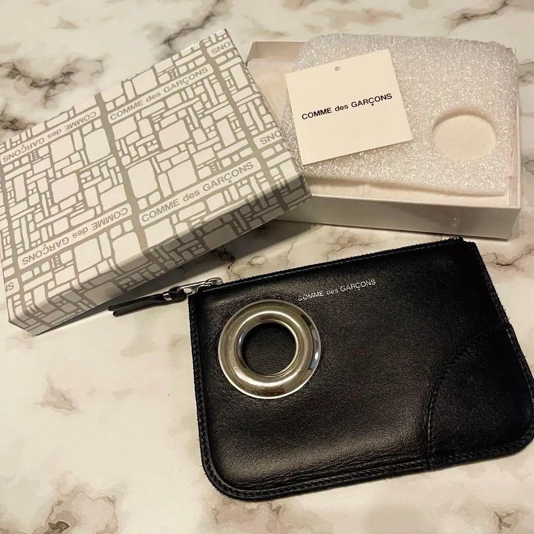 COMME des GARÇONS ケース　ポーチ　アイレット