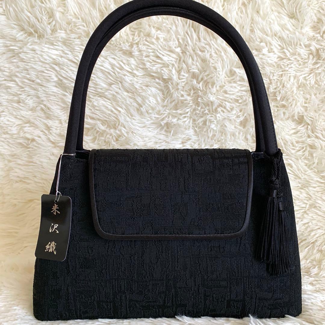 くみちゃん様　IWASA 岩佐　米沢織　フォーマルバッグ ブラック　タッセル付き