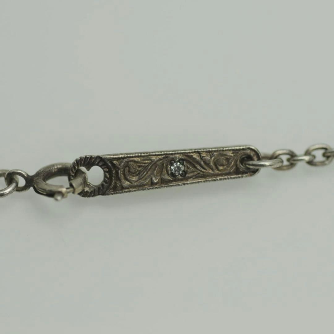 ローリーロドキン　ネックレス/シルバー925/クロス／フェザー／丸型