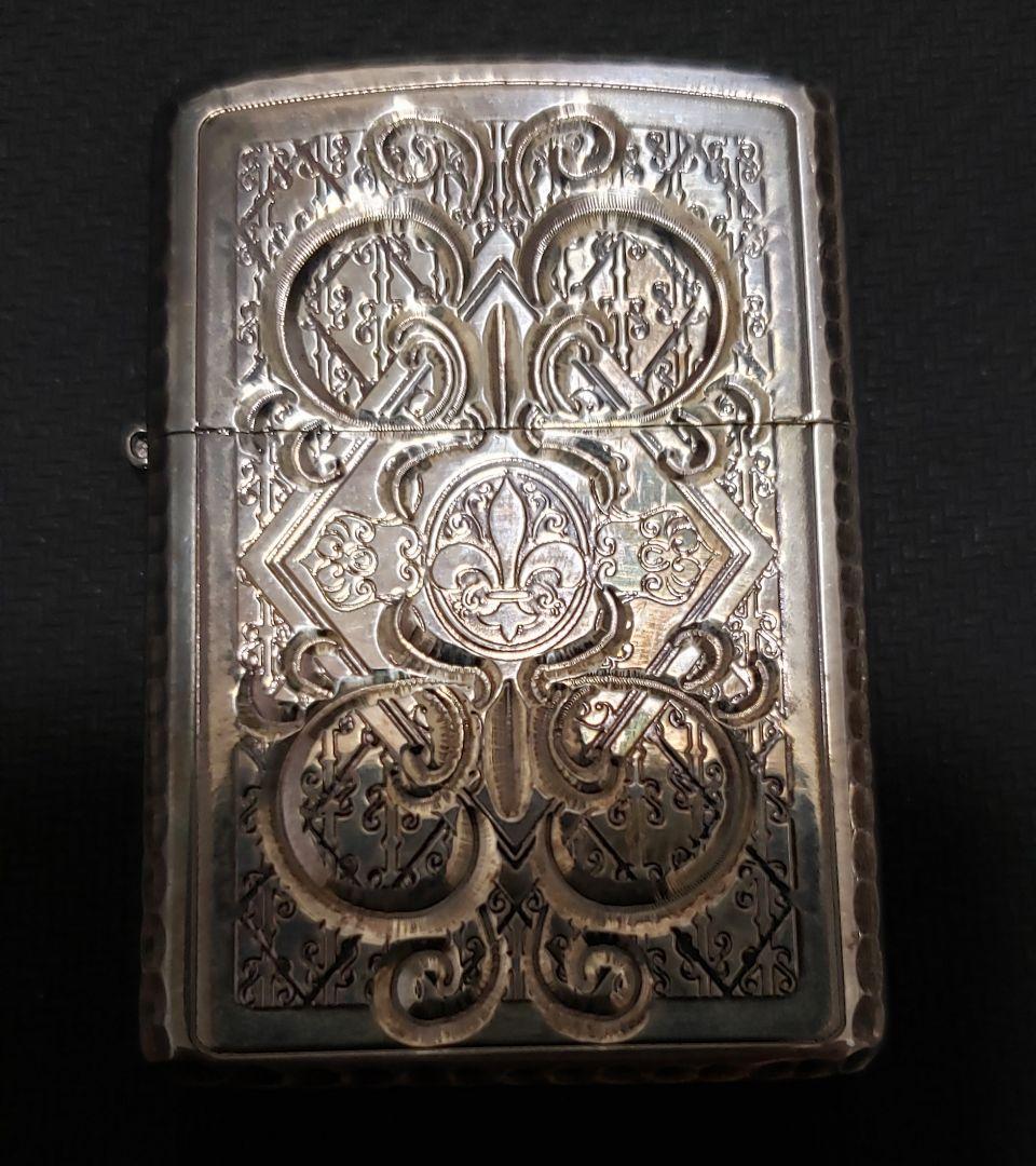 ジッポー　MAVERTEAM アーマー Zippo。5面彫刻.シャインレイカット
