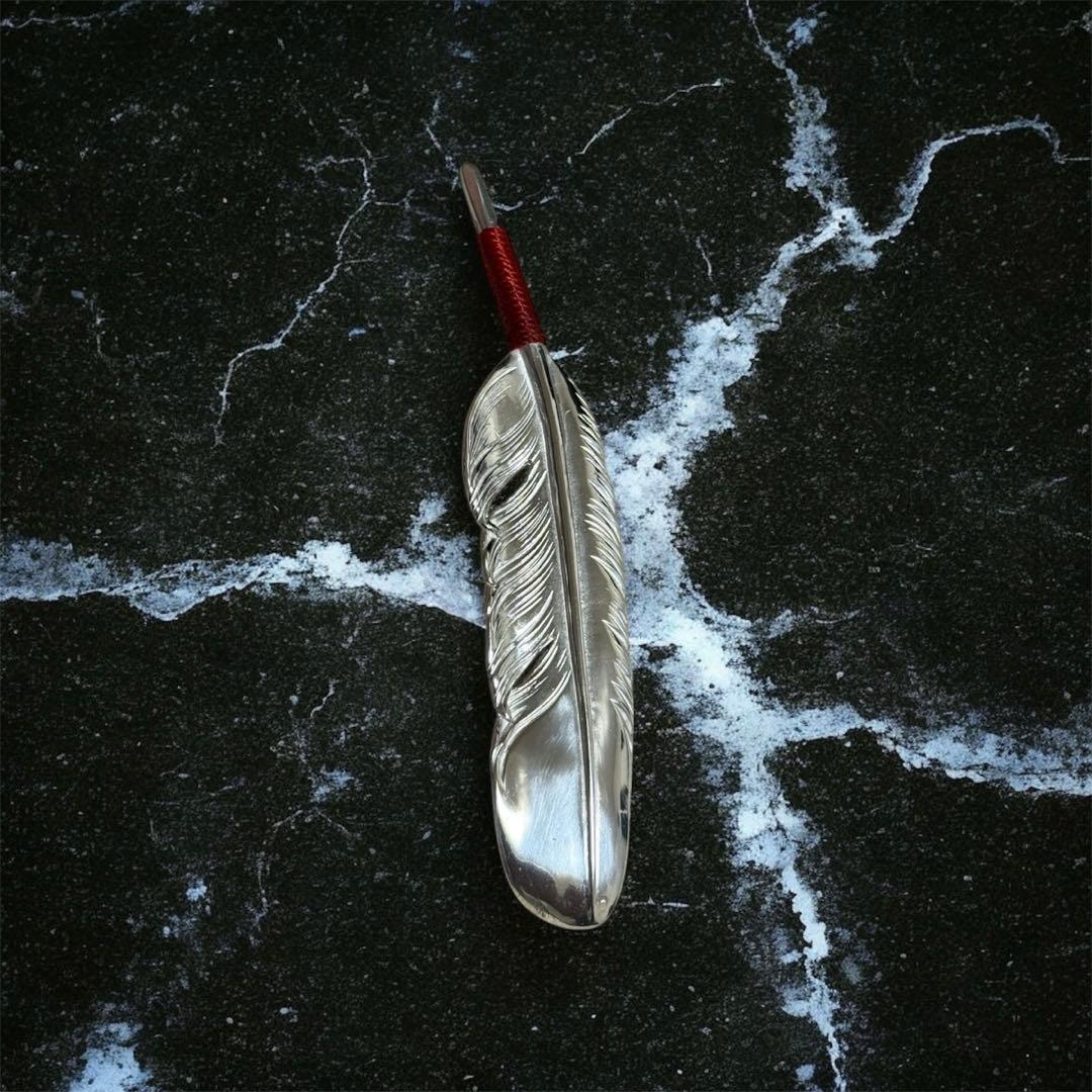 Larry smith 紐巻きフェザー左向きペンダント