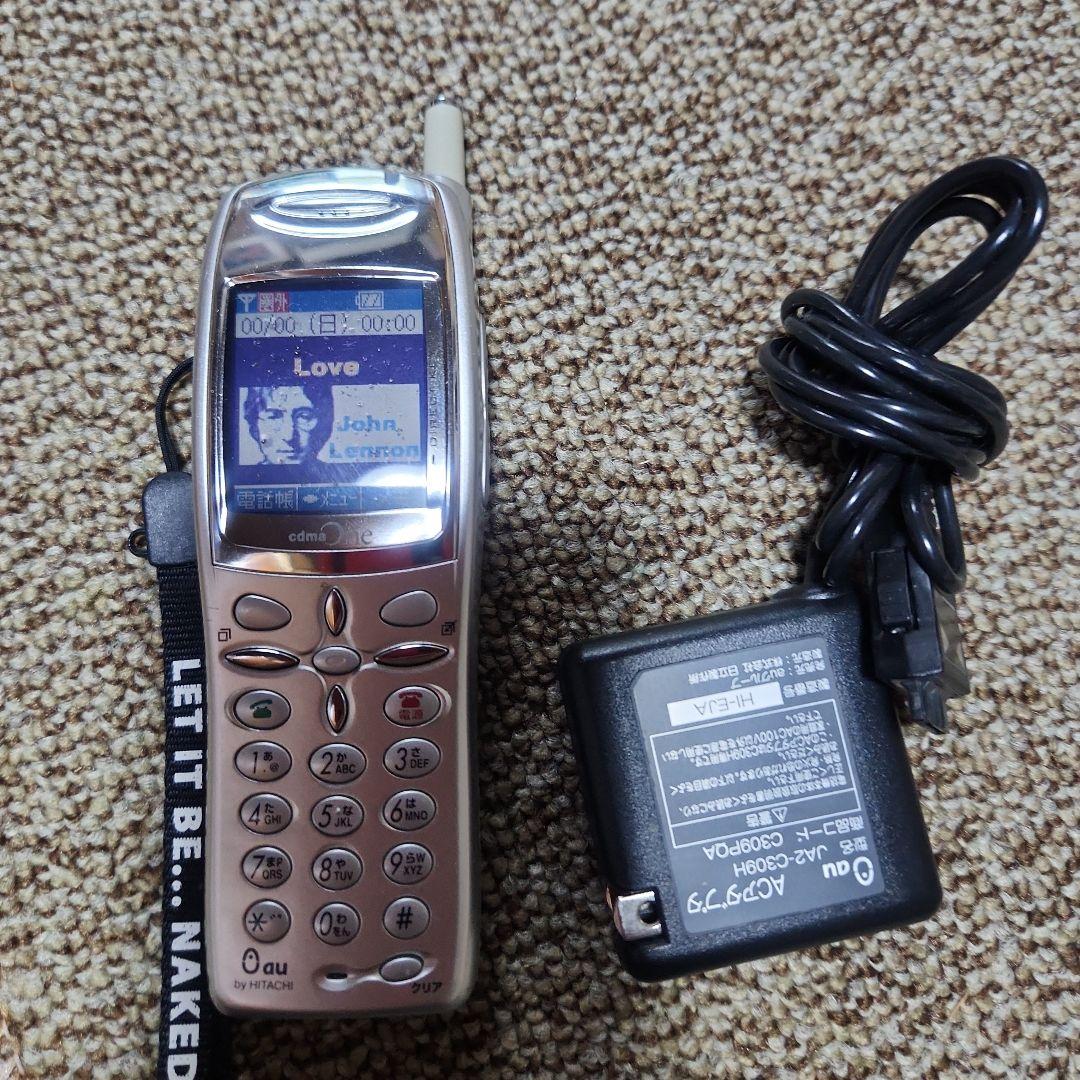 au c501SA シルバー ジョン・レノン 携帯