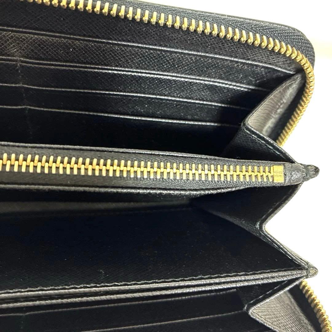 しとらす【美品】プラダ　長財布　ラウンドファスナー　三角ロゴ　レザー　黒