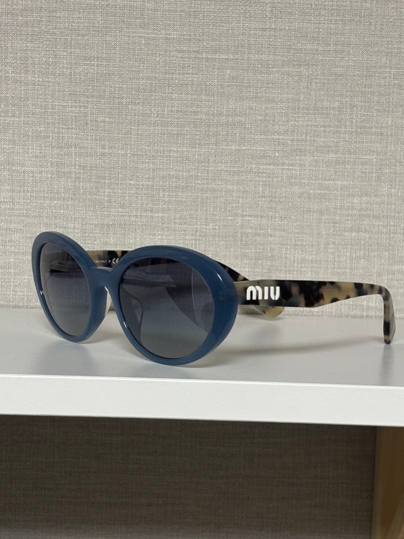 ミュウミュウ サングラス miumiu SMU01UA 1183A0