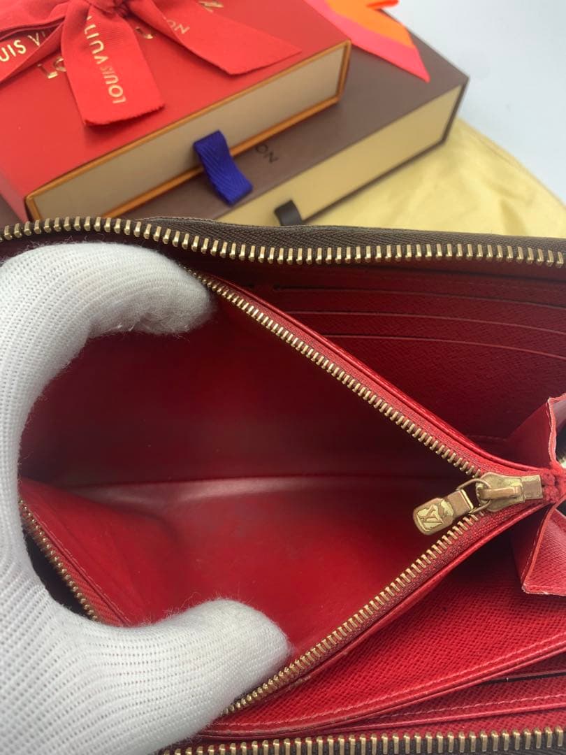 ルイヴィトン モノグラム ステッカー ジッピーウォレットコクリコ 長財布 P55