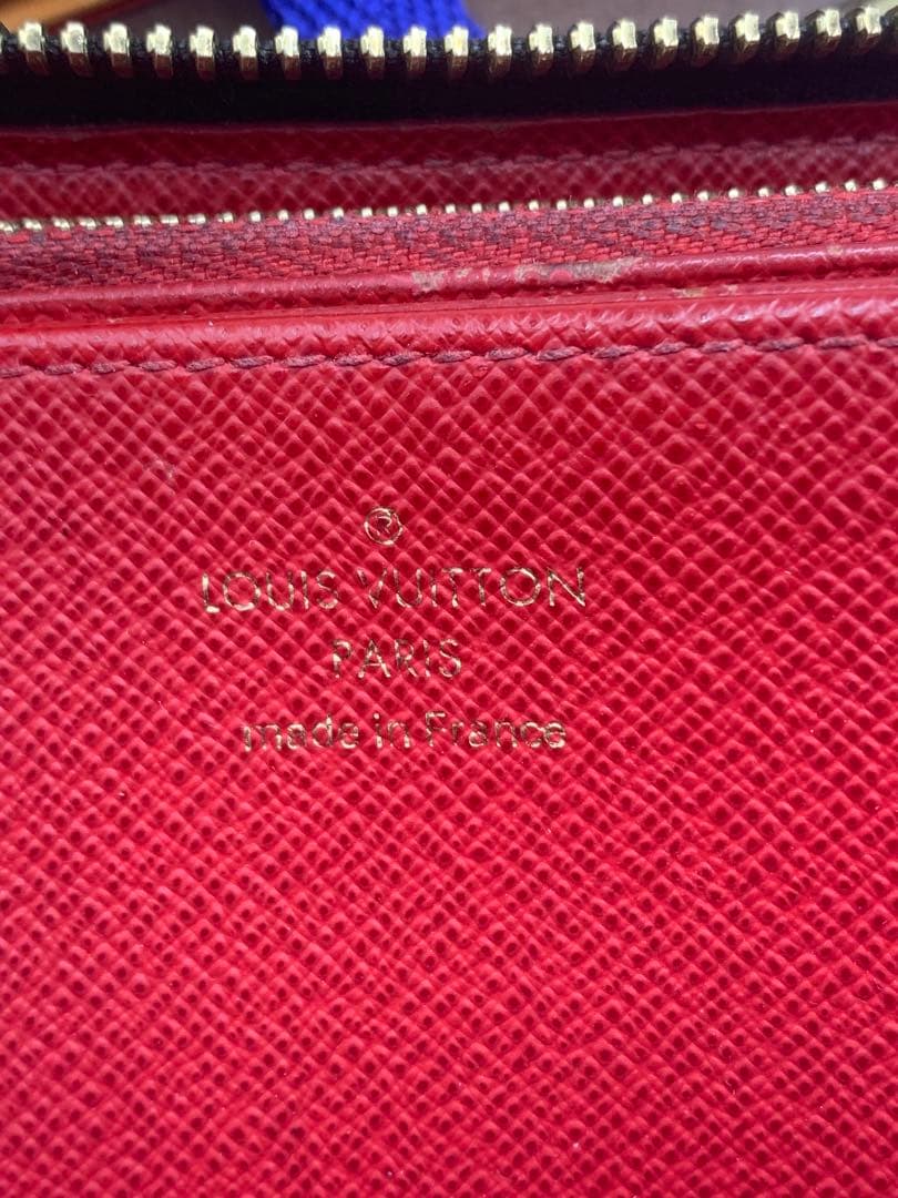 ルイヴィトン モノグラム ステッカー ジッピーウォレットコクリコ 長財布 P55