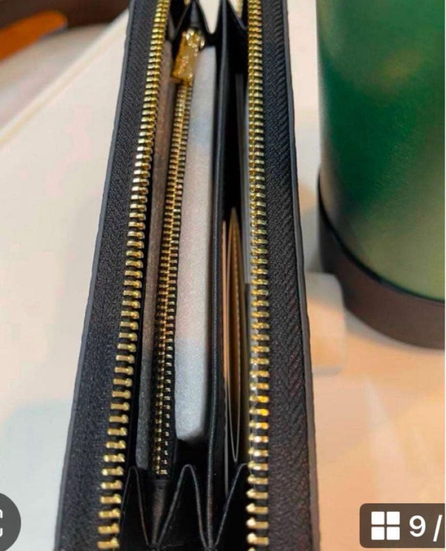 新品未使用品コーチエンボスドスネークレザー長財布【ブラック黒】メンズ　レディース