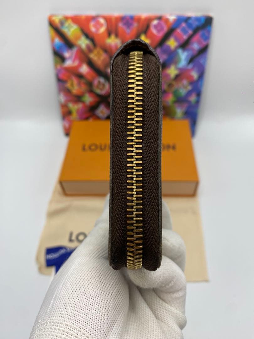 ルイヴィトン モノグラム ジッピーウォレット 長財布 ブラウンMI2173