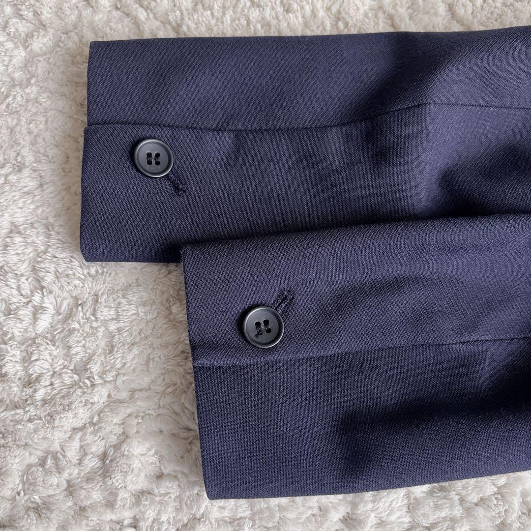 プラステ ノーカラーパンツスーツ ブラッシュドバック S/XS ネイビー