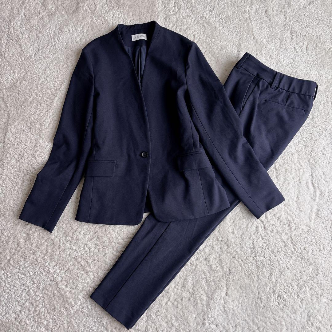 プラステ ノーカラーパンツスーツ ブラッシュドバック S/XS ネイビー