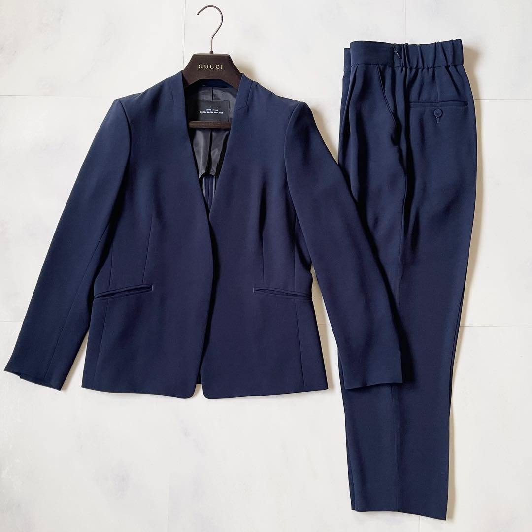 グリーンレーベルリラクシング セットアップ パンツスーツ ノーカラー S 紺色