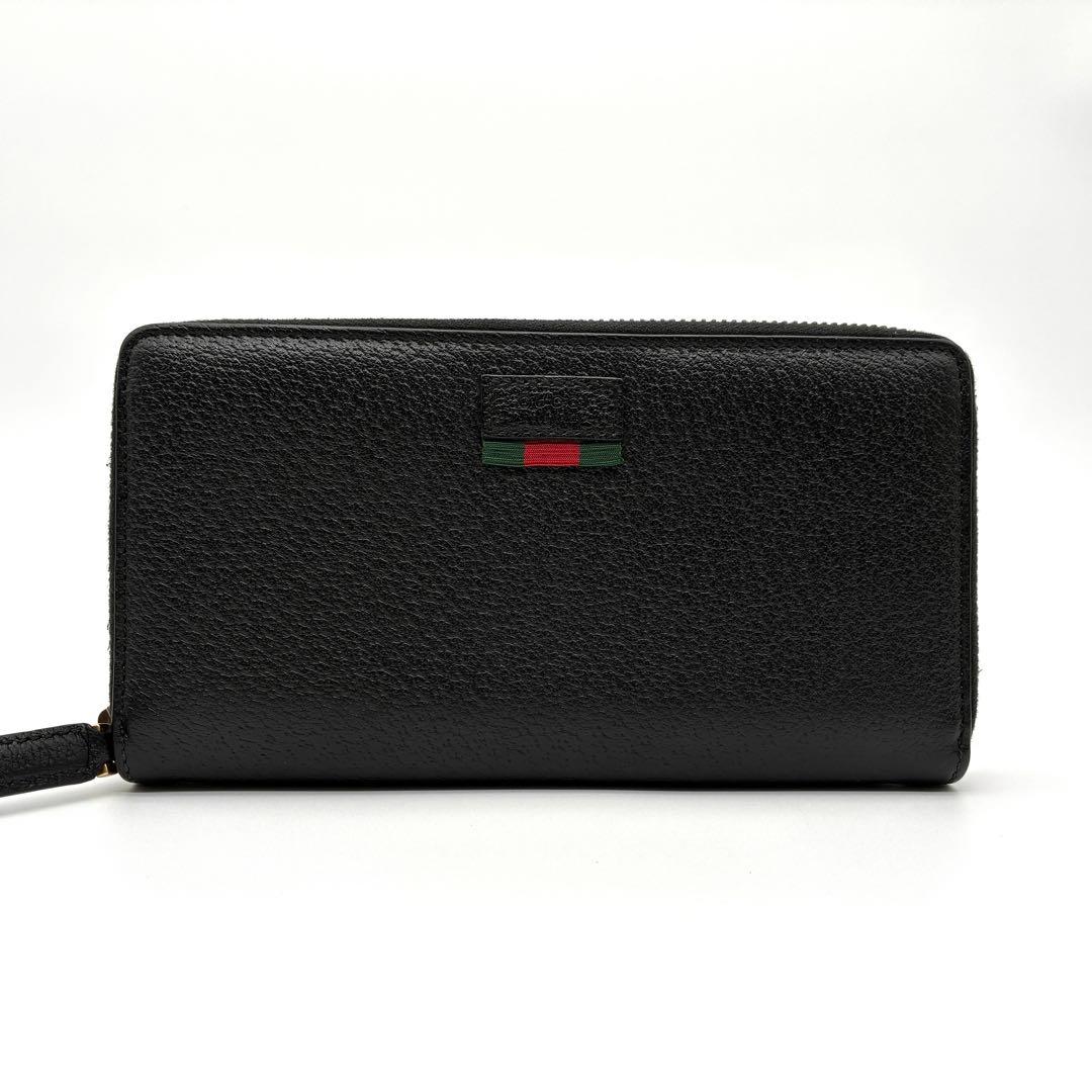 未使用に近い グッチ 長財布 シェリーライン ロゴ レザー ラウンドジップ 黒